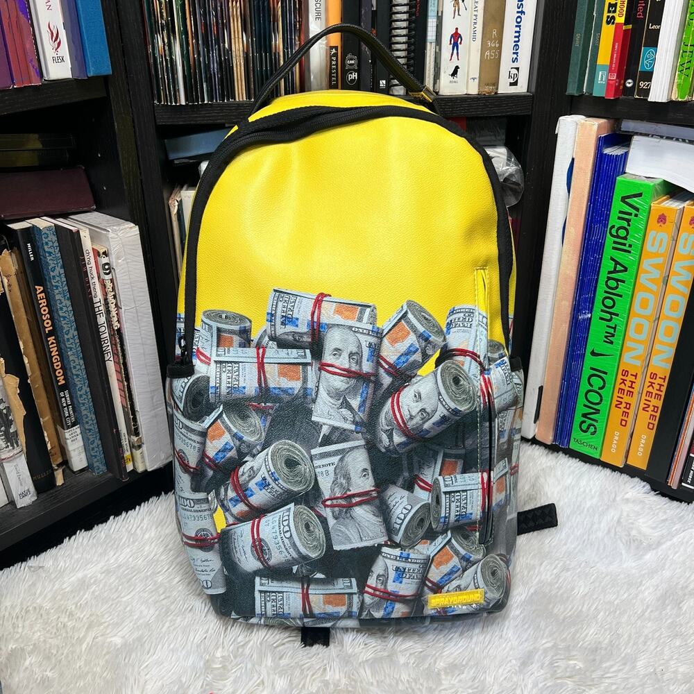 SPRAYGROUND BACKPACK THE ENTREPRENEUR MONEY BOOK BAG YELLOW 2022
